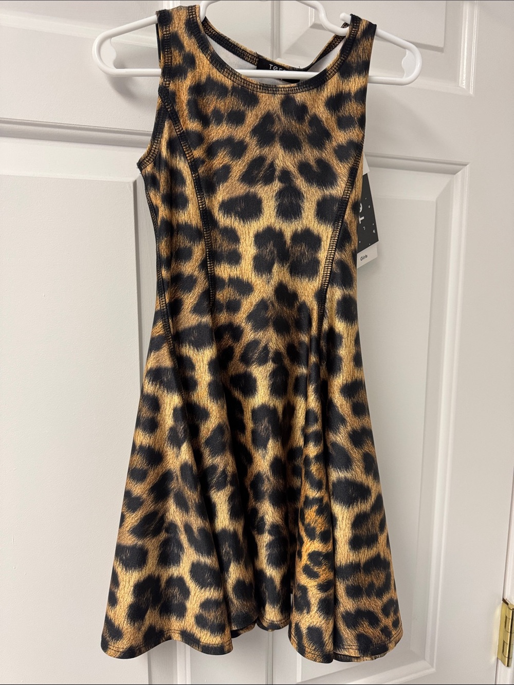 There’s size 5 Girls' Leopard Print Sleeveless Swing Dress - Brown/Black poly/sp